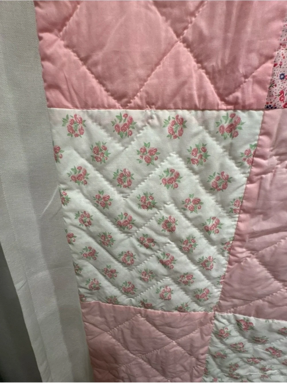 Handmade Pink Patchwork Quilt for your babies crib or toddler bed.